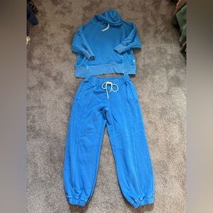 Free People Movement- sprint to the finish sweat set in classic blue color